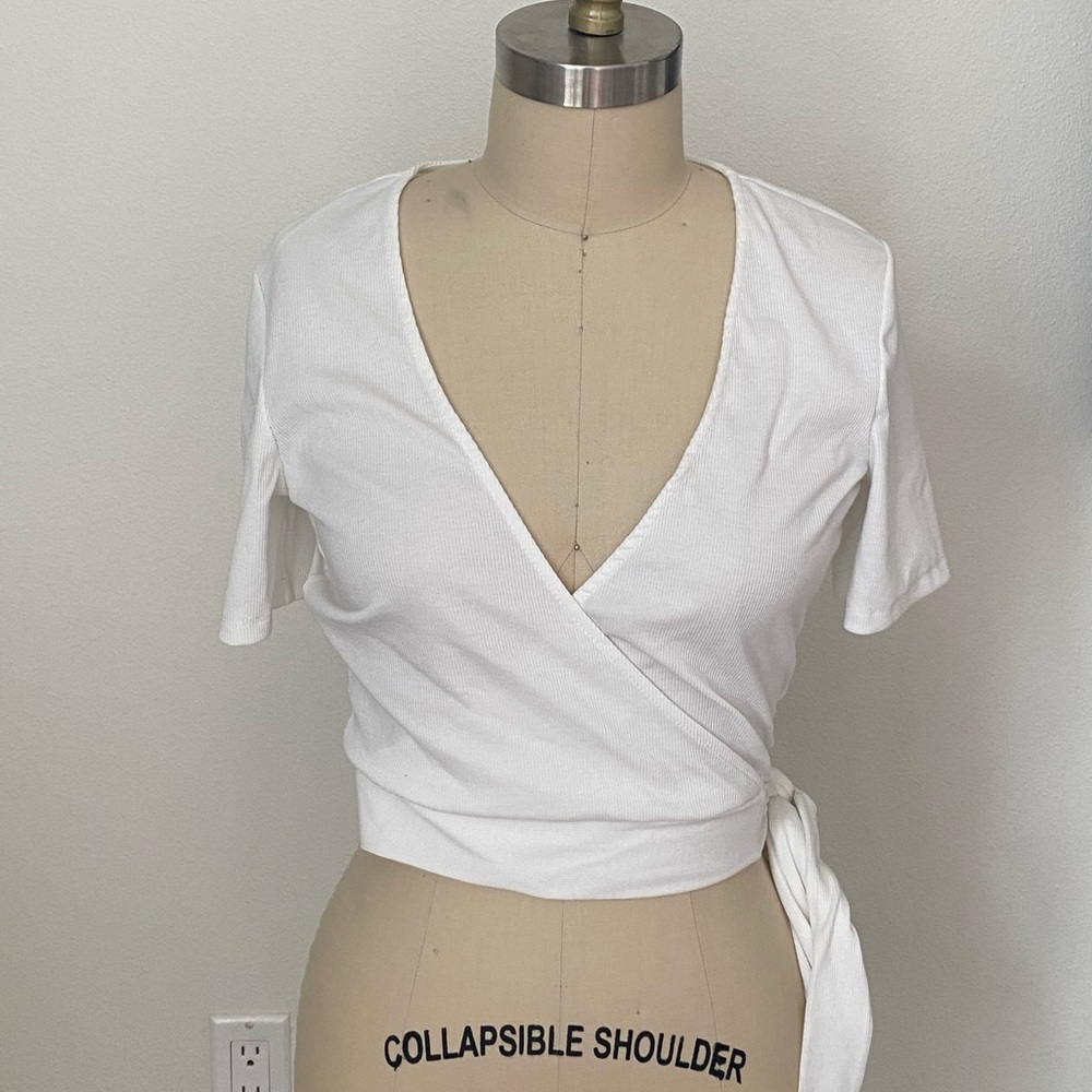 Shout sleeve knit surplus top